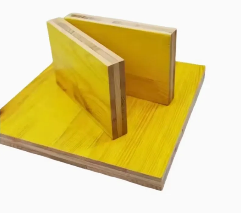 Yellow 3-ply shuttering panels stacked, edge detail